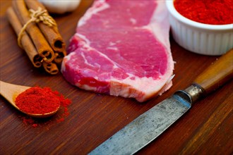 Raw uncooked ribeye beef steak butcher selection