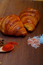 French traditiona croissant brioche butter bread on wood