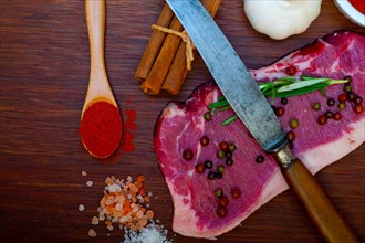 Raw uncooked ribeye beef steak butcher selection