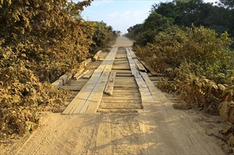 Simple wooden bridge on the dusty Transpantaneira