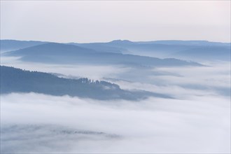View from Katzenbuckel mountain with morning mist