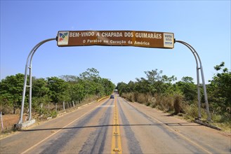 Sign above the road Welcome to Chapada dos Guimaraes NP