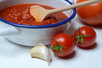 Tomatoes and peel with tomato sauce