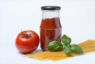 Bottle with tomato sauce