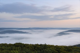 View from Katzenbuckel mountain with morning mist