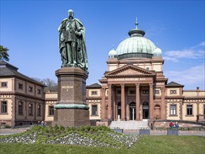 Kaiser-Wilhelms-Bad with monument to Kaiser Wilhelm I in the spa gardens