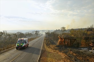 Ambulance on the main road 251 during a bushfire