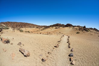 Trail through volcanic landscape