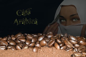 Coffee beans of the Arabica variety lying on ground coffee