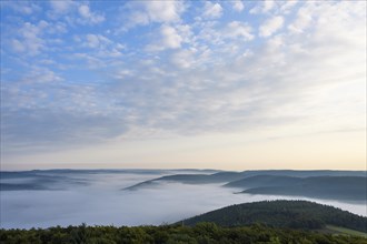 View from Katzenbuckel mountain with morning mist