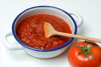 Bowl with tomato sauce