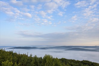 View from Katzenbuckel mountain with morning mist