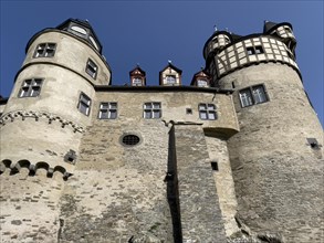 View of towers of Trier castle in double castle Buerresheim from Middle Ages