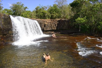 Bathers at the waterfall Cachoeira da Martinha