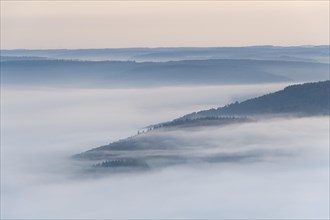 View from Katzenbuckel mountain with morning mist