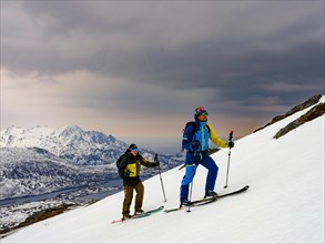 Two ski tourers on the ascent