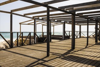 Wooden beachfront terrace during sunny day