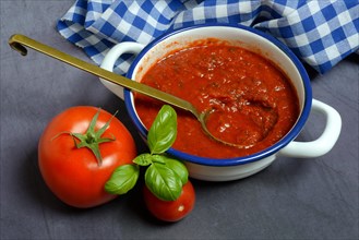 Tomatoes and peel with tomato sauce