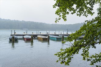 Boats on the lake shore in the morning