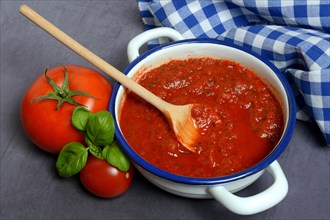 Tomatoes and peel with tomato sauce
