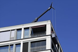 Apartment block with facade lift