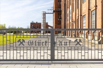 Metal fence with miner's greeting Glueck auf