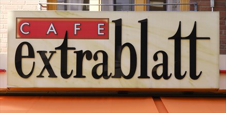Sign and logo Cafe Extrablatt