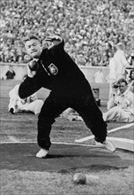 Hans Woellke won the shot put with 16.20 m and achieved a new Olympic record