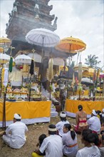 Buddhist ceremony inside Pura Sada temple in Mengwi