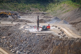 Drilling for blasting in limestone mining