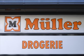 Sign and logo Mueller drugstore