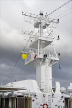 Cruise ship with yellow flag