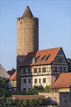 Historic half-timbered house Hinterburger Amtshaus with medieval keep Hinterturm