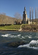 The River Lenne with the Church of St. Joseph in Nachrodt