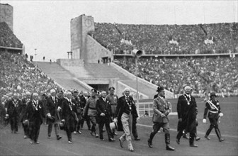 Adolf Hitler with the leaders of world sport in the stadium