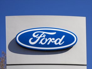 Company sign of a Ford car dealer