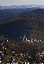 Low mountain landscape with the town and castle of Altena