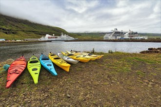 Colourful Kayaks on the Shore of the Fjord