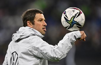 Co-coach goalkeeper coach Andreas Kronenberg GER juggles ball on arm