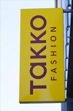 Sign and logo TAKKO Fashion