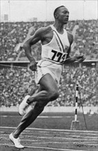 Jesse Owens sets with 10. 2 sec. world record in 2nd 100 m run