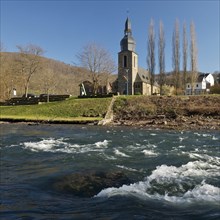 The River Lenne with the Church of St. Joseph in Nachrodt