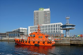 Pilot boat in front of the Hotel Maritim and Hotel Aja