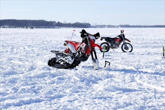 Motorized snowbike on a frozen surface