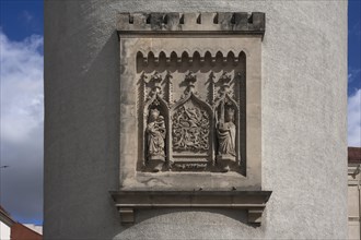 Sandstone relief with city coat of arms from the 15th century on the Thick Tower
