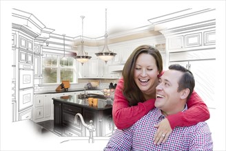 Happy laughing couple with kitchen design drawing and photo behind