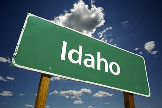 Idaho road sign with dramatic clouds and sky