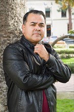 Headshot portrait of handsom hispanic man