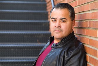 Headshot portrait of handsom hispanic man