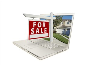 For sale sign & new home on laptop isolated on a white background